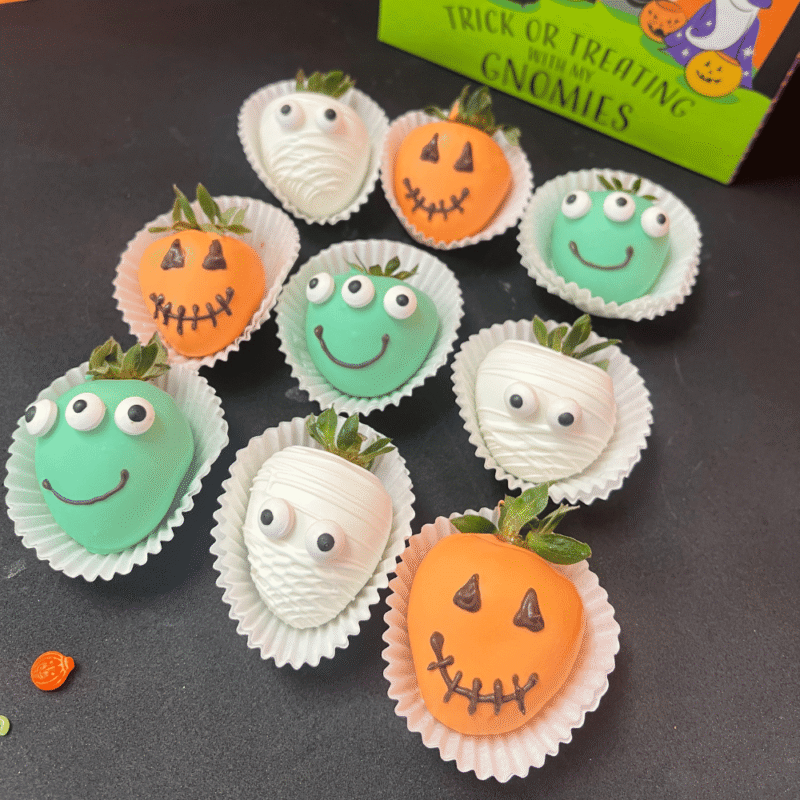 Halloween chocolate-covered strawberries decorated as pumpkins, mummies, and green monsters β handmade by Frutidetails Miami.